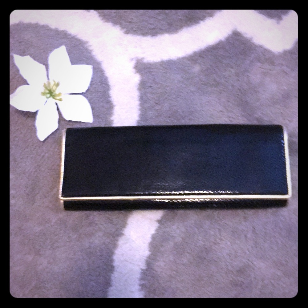 Black snakeskin clutch